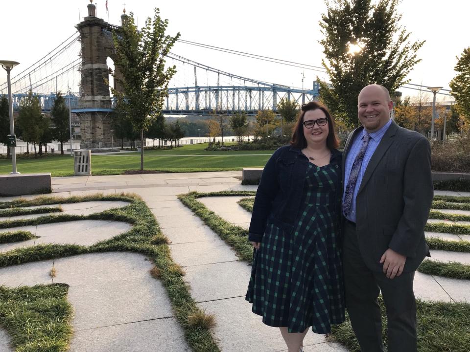 Married IRS employees Becky Ayers Culver and Justin Culver, seen at Smale Riverfront Park in Cincinnati, are among the 800,000 federal workers going without a paycheck during the government shutdown.