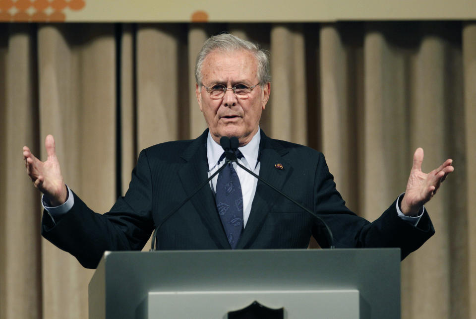 FILE - In this Oct. 11, 2011, file photo, former U.S. Secretary of Defense Donald Rumsfeld speaks to politicians and academics during a luncheon on security in rising Asia, in Taipei, Taiwan. The family of Rumsfeld says he has died. He was 88. (AP Photo/Wally Santana, File)