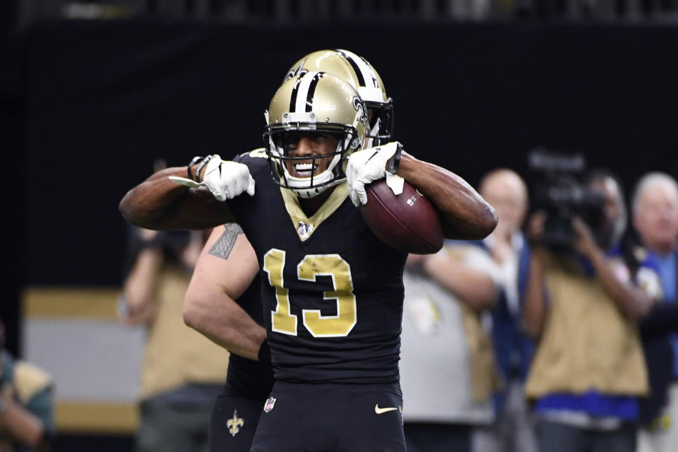 New Orleans Saints wide receiver Michael Thomas (13) celebrates his touchdown reception in the first half of an NFL football game against the Indianapolis Colts in New Orleans, Monday, Dec. 16, 2019. (AP Photo/Bill Feig)