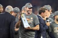 Oct 21, 2017; Houston, TX, USA; Houston Astros starting pitcher Justin Verlander (35) holds the MVP trophy after game seven of the 2017 ALCS playoff baseball series between the Houston Astros and the New York Yankees at Minute Maid Park. Thomas B. Shea-USA TODAY Sports