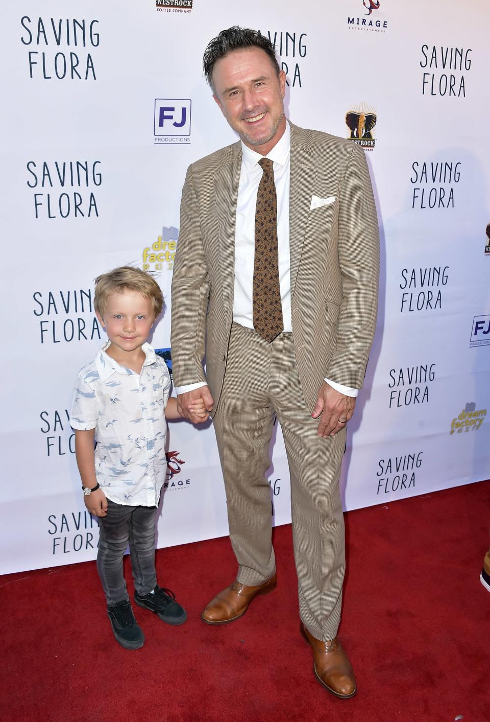 David Arquette brings son Charlie West as his date to the <em>Saving Flora</em> premiere in L.A. on Monday.