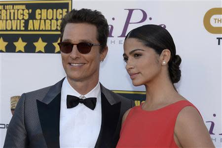 Actor Matthew McConaughey and wife, model Camila Alves McConaughey, arrive at the 19th annual Critics' Choice Movie Awards in Santa Monica, California January 16, 2014. REUTERS/Kevork Djansezian