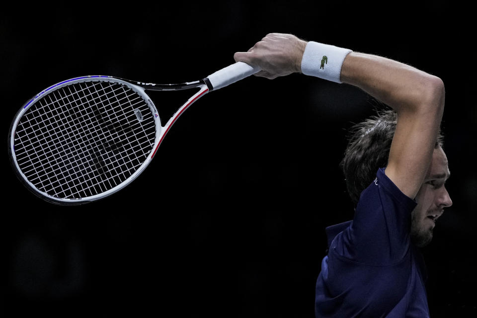 Russian Tennis Federation's Daniil Medvedev returns the ball to Spain's Pablo Carreno Busta during their Davis Cup tennis match at Madrid Arena in Madrid, Spain, Sunday, Nov. 28, 2021. (AP Photo/Bernat Armangue)