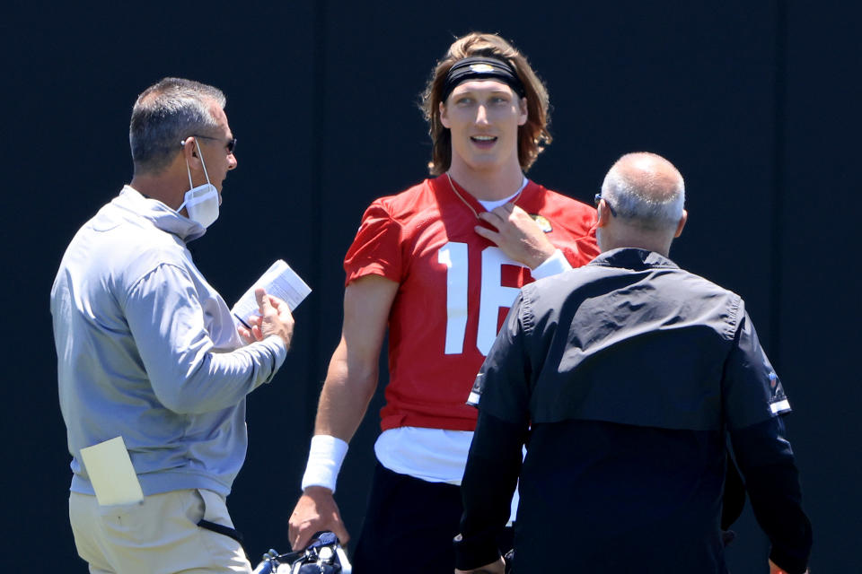 Jaguars head coach Urban Meyer speaks with Trevor Lawrence during rookie camp on May 15 in Jacksonville, Florida. (Photo by Sam Greenwood/Getty Images)