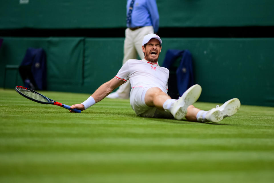 <p>LONDON, ENGLAND - JULY 02: Andy Murray of Great Britain slips over on the grass during his match against Dennis Shapovalov of Canada in the third round of the gentlemen's singles during Day Five of The Championships - Wimbledon 2021 at All England Lawn Tennis and Croquet Club on July 02, 2021 in London, England. (Photo by TPN/Getty Images)</p>
