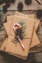 <p>In this traditional office party game, participants select a name at random (usually out of a hat), then shop for a small <a href="https://www.oprahmag.com/life/g34436292/secret-santa-gifts/" rel="nofollow noopener" target="_blank" data-ylk="slk:Secret Santa gift;elm:context_link;itc:0;sec:content-canvas" class="link ">Secret Santa gift</a> under about $20. If you're celebrating from a distance this year, you can still partake in the celebratory Christmas activity—simply arrange a game via mail. It takes a little more planning, but it's just as fun. </p>