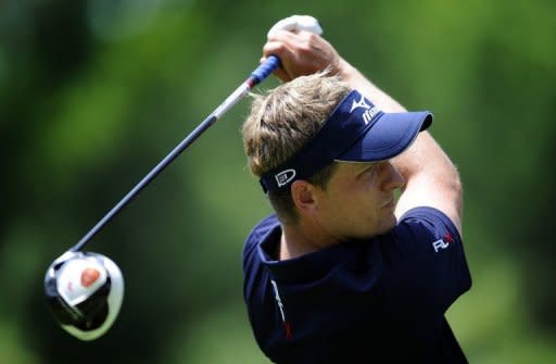 World number one Luke Donald, pictured in 2011, put himself back into winning contention after shooting a flawless second round 68 on Friday to be just three shots back in the defence of his Scottish Open title