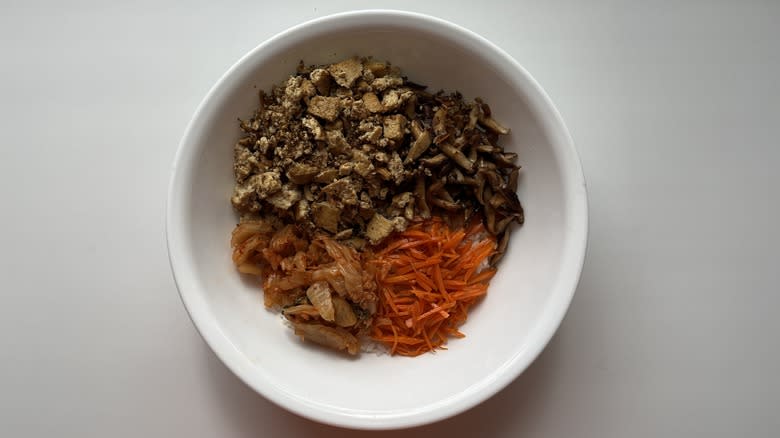 tofu rice and vegetables in mixing bowl