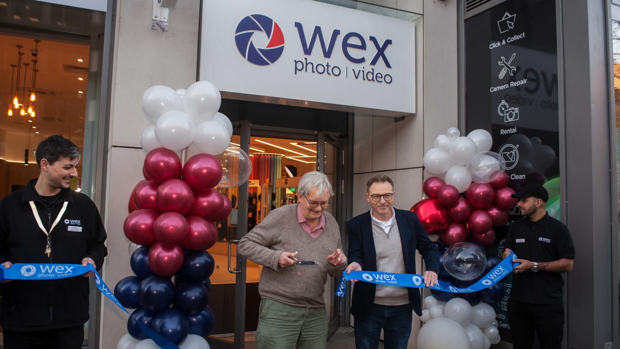  Documentary photographer Martin Parr cutting the ribbon to open Wex Photo Video – pictured next to him is Louis Wahl, Wex Photo Video CEO. 