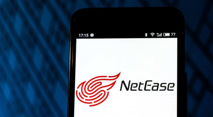 netease (NTES) logo on a mobile phone screen representing earnings reports