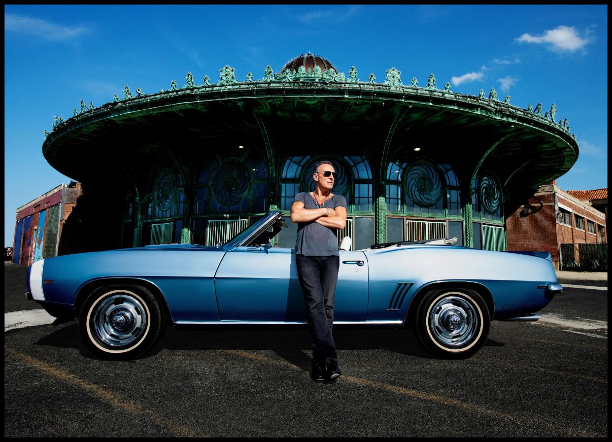 Bruce Springsteen in front of the Carousel Building in Asbury Park, N.J.