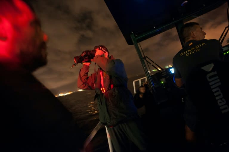 A member of the Spanish civil guard peers across the Strait of Gibraltar in southern Spain, where drugs smugglers have become increasingly brazen