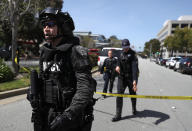 <p>Law enforcement stands watch outside of the YouTube headquarters on April 3, 2018 in San Bruno, Calif. (Photo: Justin Sullivan/Getty Images) </p>