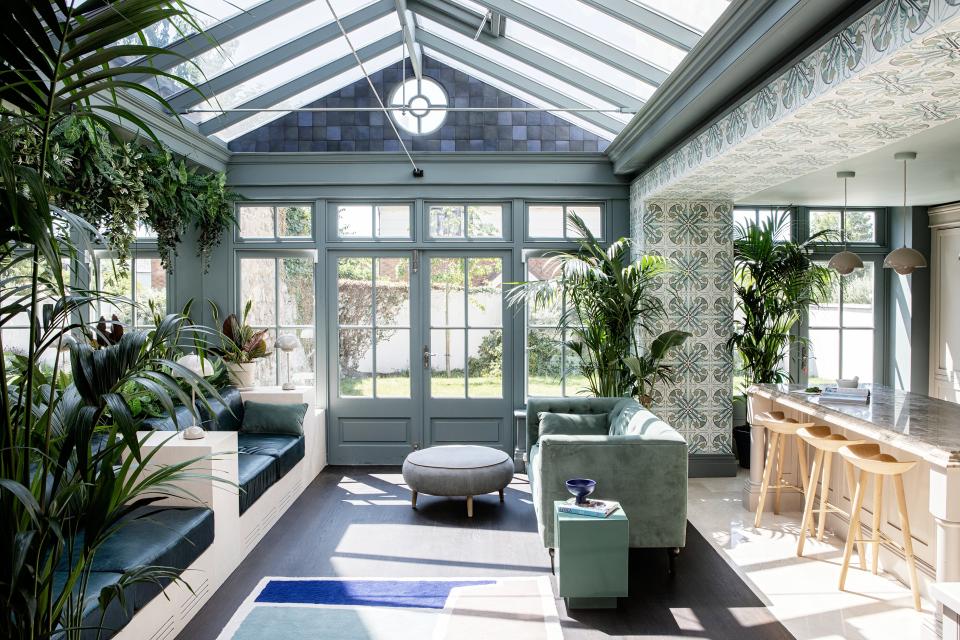 open plan kitchen with glass roof and tiled beams