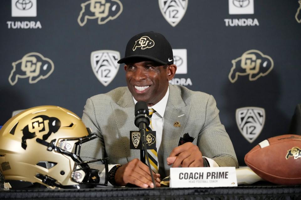 Deion Sanders speaks after being introduced as the new head football coach at the University of Colorado during a news conference Sunday, Dec. 4, 2022, in Boulder, Colo. (AP Photo/David Zalubowski)