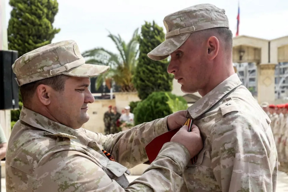 <div class="inline-image__caption"><p>A Russian soldier is awarded the Participant in Military Operations in Syria medal during the Victory Day parade in Syria's northern city of Aleppo on May 9, 2022.</p></div> <div class="inline-image__credit">AFP via Getty Images</div>