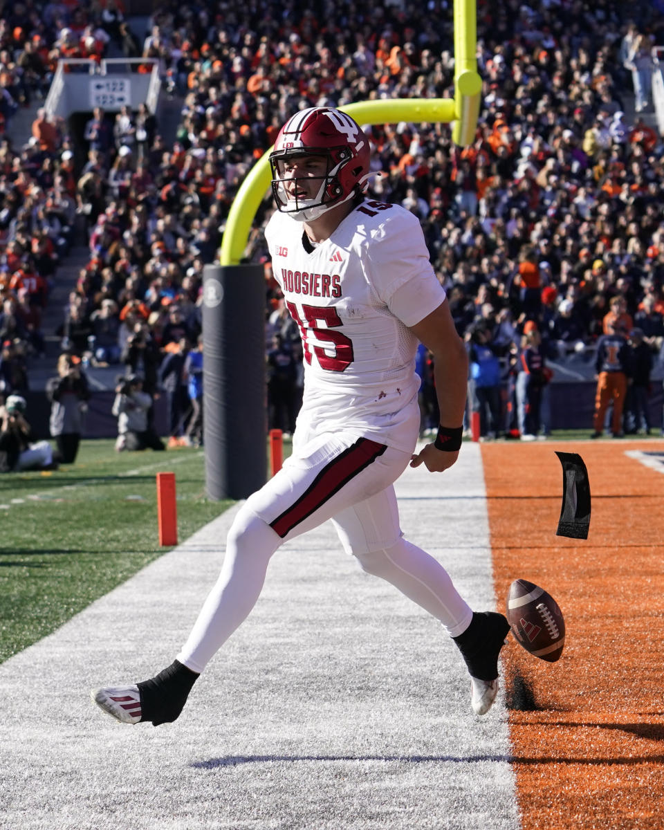 Indiana quarterback Brendan Sorsby celebrates his touchdown during the first half of an NCAA college football game against Illinois Saturday, Nov. 11, 2023, in Champaign, Ill. (AP Photo/Charles Rex Arbogast)