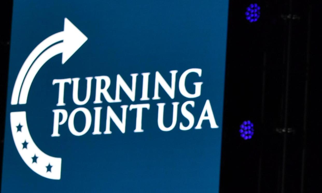 <span>A Turning Point USA logo at a summit in Palm Beach, Florida, in 2019.</span><span>Photograph: Nicholas Kamm/AFP/Getty Images</span>