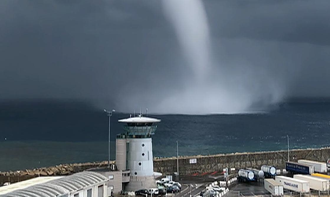 <span>A waterspout off the French island of Corsica. A marine biologist says there is an ‘absolute direct link’ between the anomalous sea temperatures this summer and the storm that sank the Bayesian yacht.</span><span>Photograph: Pierre Mattei/AFP/Getty Images</span>