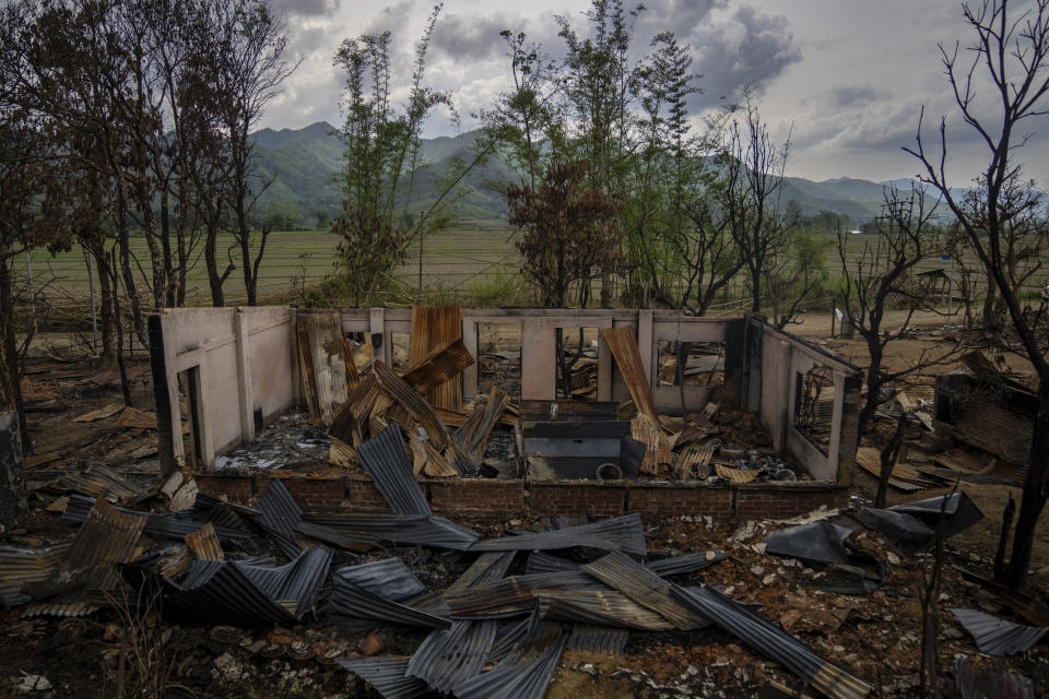 The shell of a burnt houses stands following ethnic clashes and rioting in Sugnu, in the northeastern Indian state of Manipur, Wednesday, June 21, 2023. Manipur has been reeling under a spree of killings, arson and a rampage of hate after Christian Kukis and mostly Hindu Meiteis began clashing against each other in May. A video that went viral late Wednesday, July 19, is emblematic of the deadly conflict. The video shows two naked women being surrounded by scores of young men who grope their private parts and drag them to a nearby field. (AP Photo/Altaf Qadri)