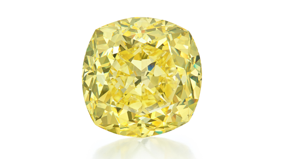 A Cushion modified brilliant-cut Fancy Vivid Yellow diamond