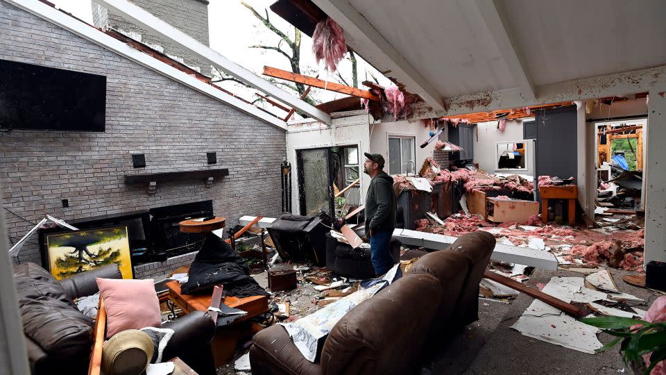 Ryan Whitten walks around his destroyed home Thursday, May 9, 2024, in Columbia, Tennessee. - Mark Zaleski/The Tennessean/USA Today Network