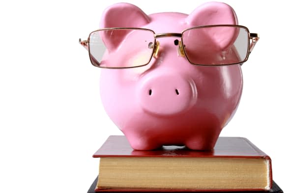 piggy bank with glasses and...