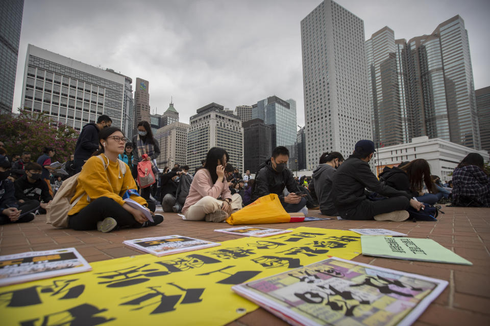Protesters gather during a rally in Hong Kong, Sunday, Dec. 15, 2019. Hong Kong police said on Saturday that they have arrested three men for testing homemade explosives they suspect were intended for use during protests. (AP Photo/Mark Schiefelbein)