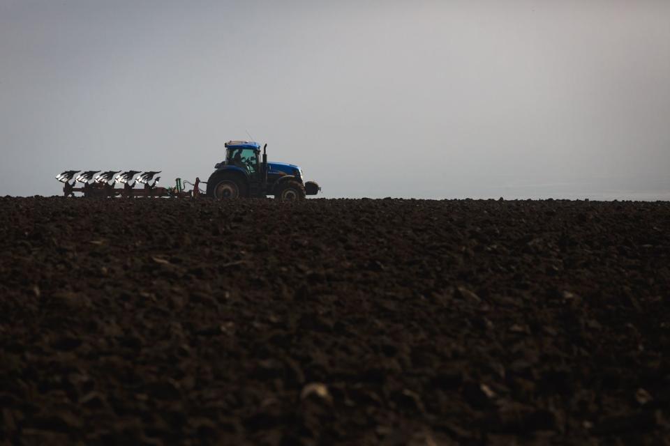 A farmer plows an agriculture field in Zaporizhzhia Oblast, Ukraine on Oct. 23, 2023 (Yurii Stefanyak/Global Images Ukraine via Getty Images)