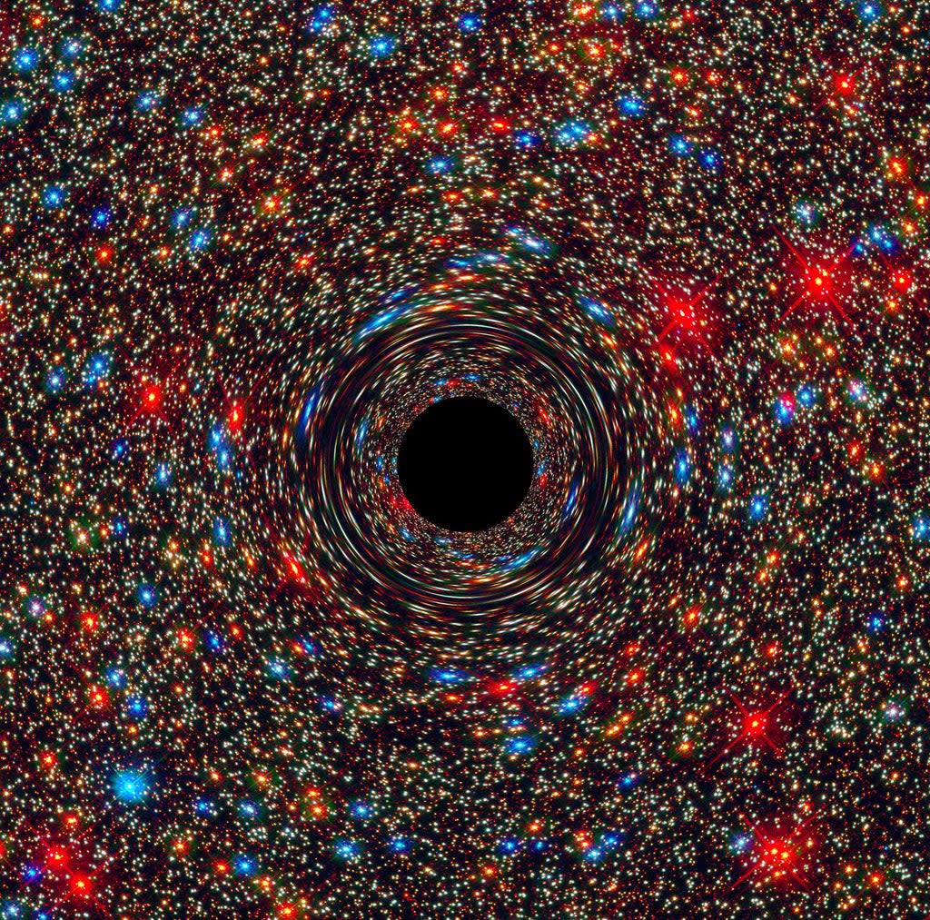 A computer simulation of a supermassive black hole at the center of a galaxy (Nasa)