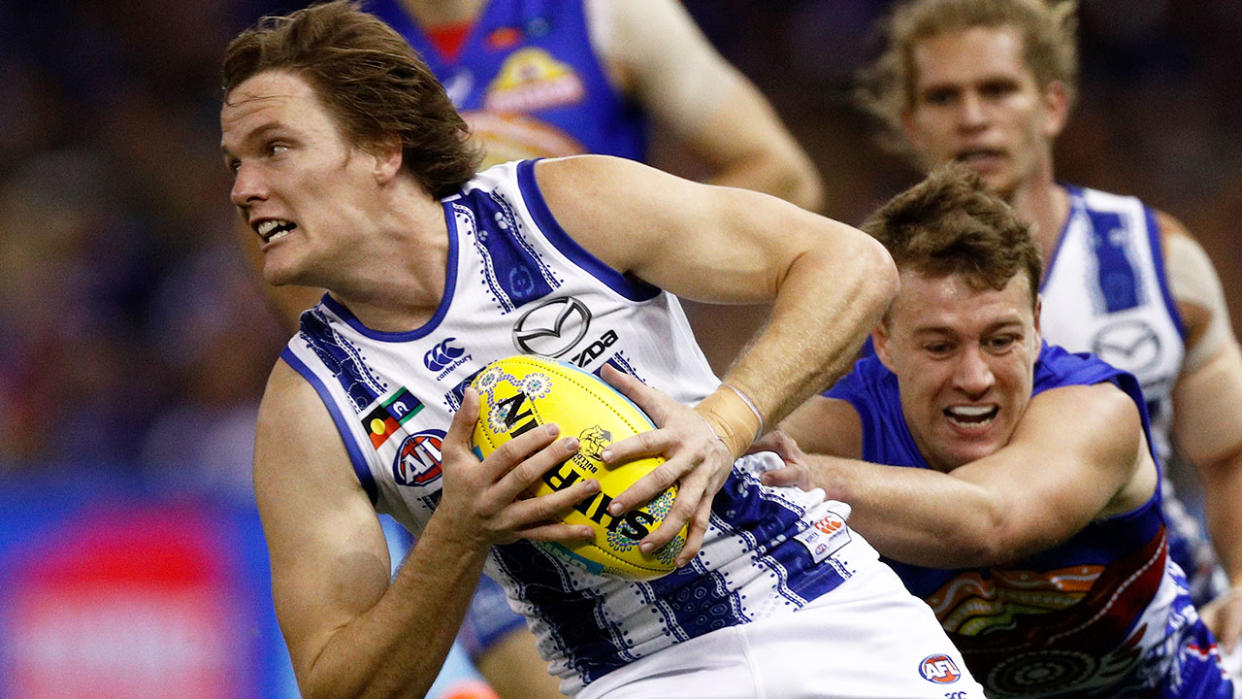 Pictured here, Jared Polec in action for North Melbourne in the AFL.