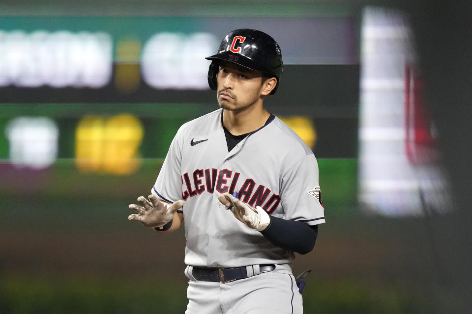 Cleveland Guardians' Steven Kwan looks back at teammates after his double off Chicago Cubs starting pitcher Marcus Stroman during the third inning of a baseball game Saturday, July 1, 2023, in Chicago. (AP Photo/Charles Rex Arbogast)