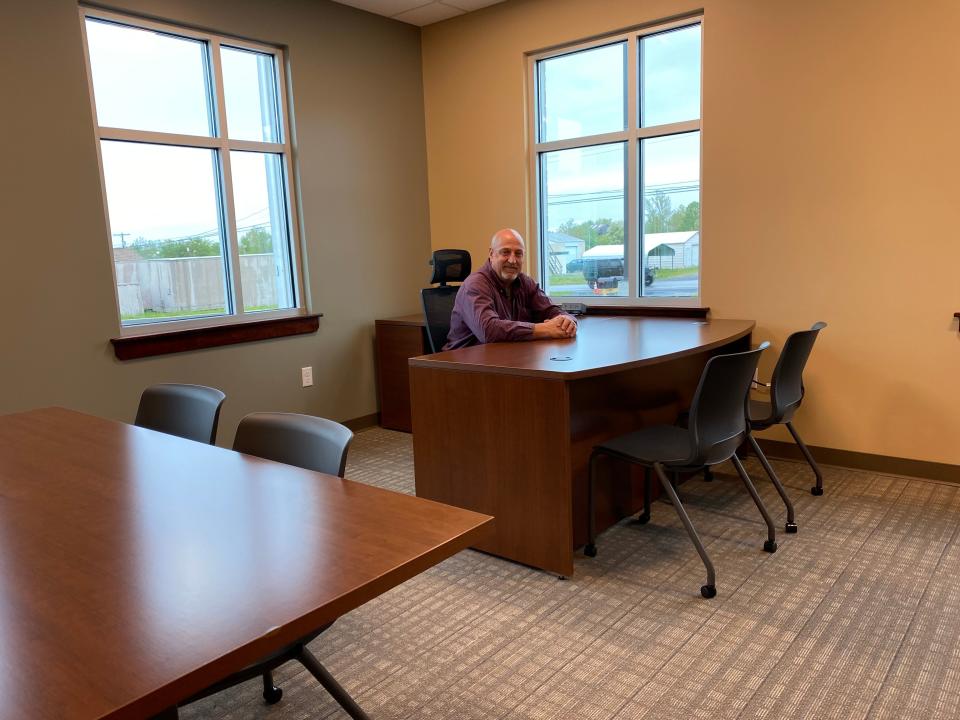 Vernon Ashway sits at the desk in the township manager’s office at the new Washington Township municipal building. Ashway, currently assistant manager, will become township manager after Jeff Geesaman retires at the end of July.