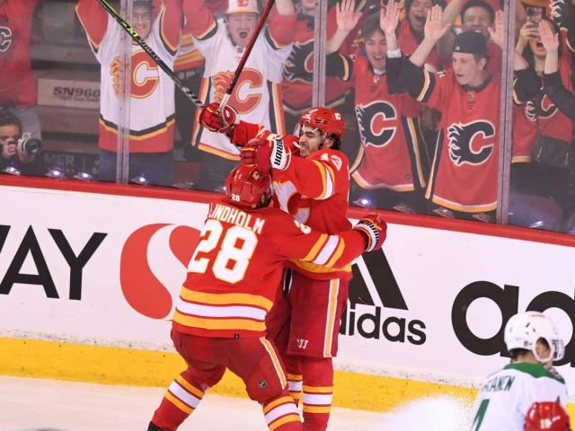 Tkachuk, Toffoli lead Flames past Wild for franchise-record 11th