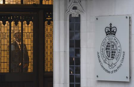 A member of security stands guard inside the Supreme Court in London, Britain, January 23, 2017. REUTERS/Toby Melville