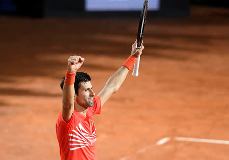 Tennis - ATP 1000 - Italian Open - Foro Italico, Rome, Italy - May 18, 2019 Serbia's Novak Djokovic celebrates after winning his semi final match against Argentina's Diego Schwartzman REUTERS/Giuseppe Maffia