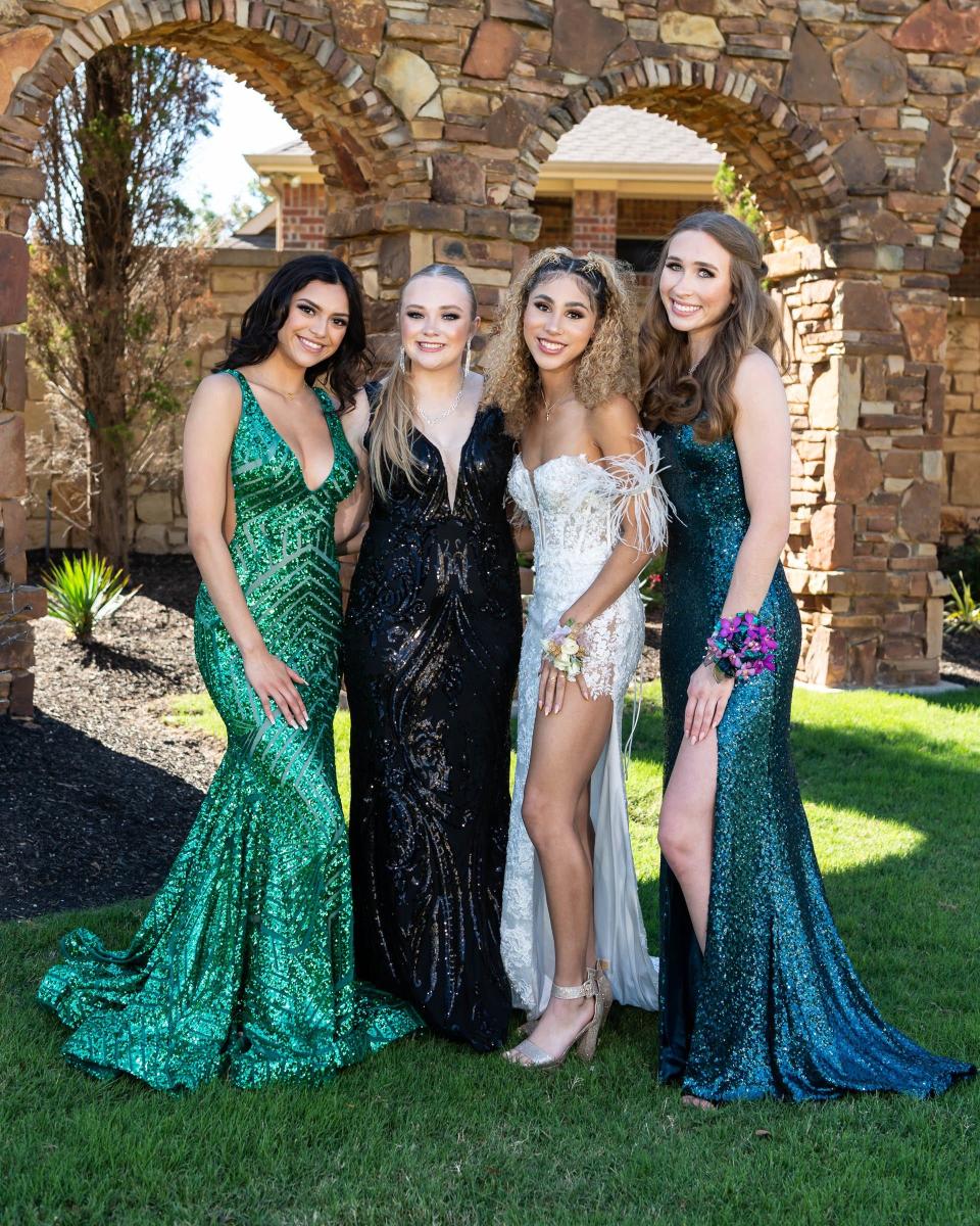 Payton Washington (in white, with her friends Shanelle, Tyler and Kaitlin), a Stony Point cheerleader who was in intensive care after being shot twice on April 18, made it to her prom on Saturday. She was using a wheelchair for mobility, and moving slowly, but could still smile for photos.