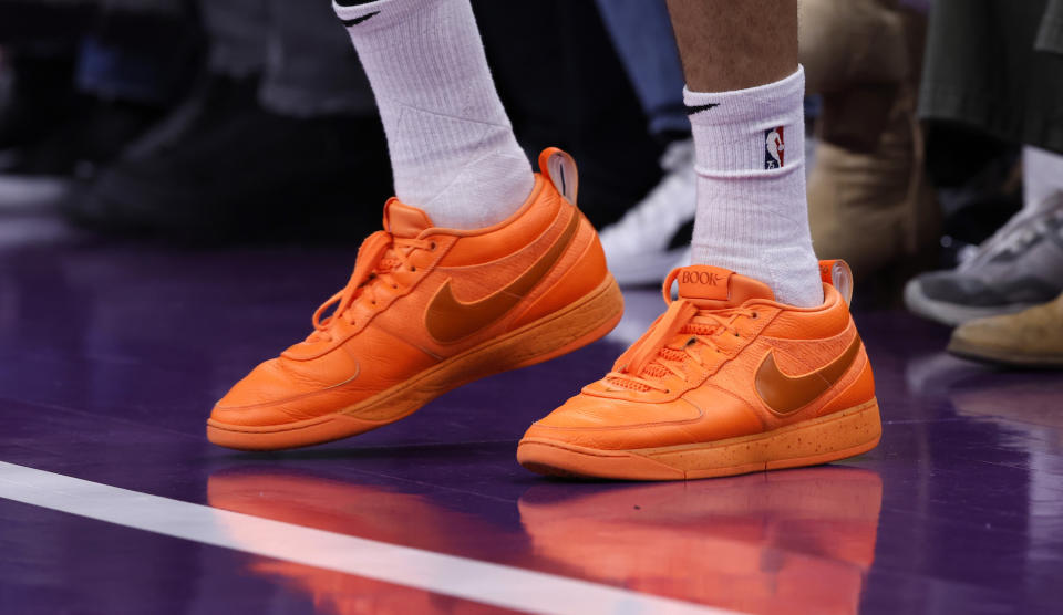 PHOENIX, ARIZONA - NOVEMBER 21: Close up of the shoes worn by Devin Booker #1 of the Phoenix Suns during the NBA In-Season Tournament game against the Portland Trail Blazers at Footprint Center on November 21, 2023 in Phoenix, Arizona. The Suns defeated the Blazers 120-107. NOTE TO USER: User expressly acknowledges and agrees that, by downloading and or using this photograph, User is consenting to the terms and conditions of the Getty Images License Agreement. (Photo by Chris Coduto/Getty Images)