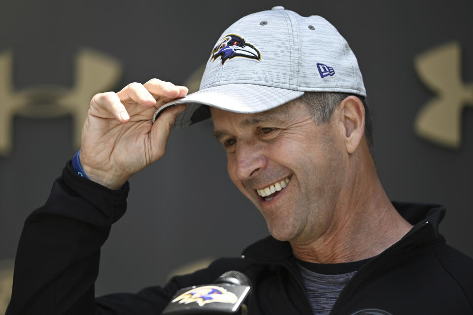 Baltimore Ravens head coach John Harbaugh answers question after an NFL football practice Wednesday, May 25, 2022, in Owings Mills, Md. (AP Photo/Gail Burton)