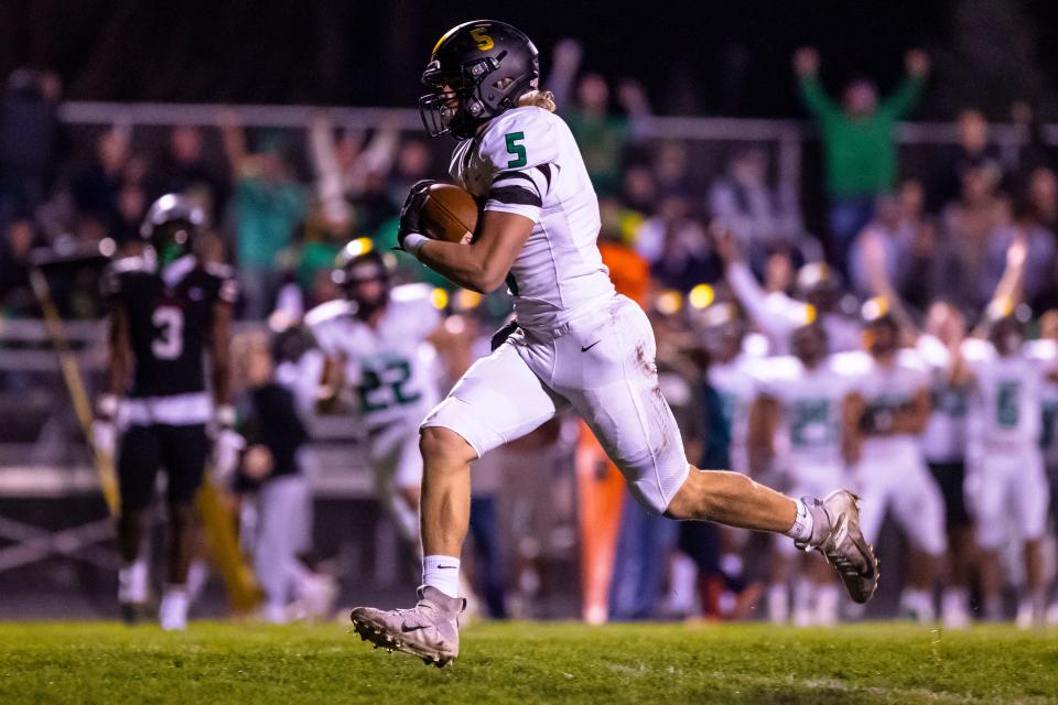 Northridge’s Mcclain Miller (5) runs for a touchdown during the Northridge vs. NorthWood sectional championship game Friday, Nov. 4, 2022 at NorthWood High School in Nappanee.