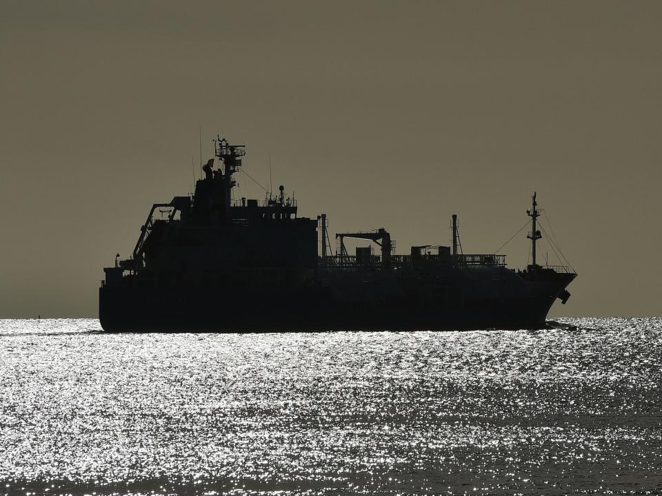 An oil tanker sailing off the coast of Southampton, England (GLYN KIRK/AFP via Getty Images)