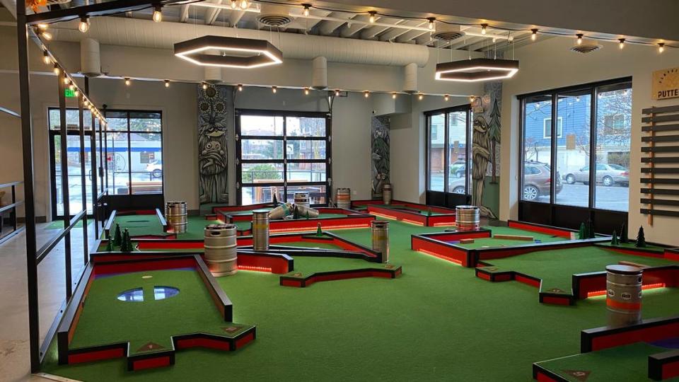 The miniature golf area at Flatstick Pub on Thursday, March 4, 2021, at 902 N. State St., Bellingham, Wash. It’s currently offering a food menu of pizza and salads.