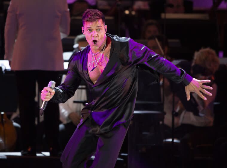 Ricky Martin performs at the Hollywood Bowl during his first of two shows at the Los Angeles landmark on Friday, July 22, 2022. Gustavo Dudamel and the Los Angeles Philharmonic accompanied the Puerto Rican singer along with Martin's band.