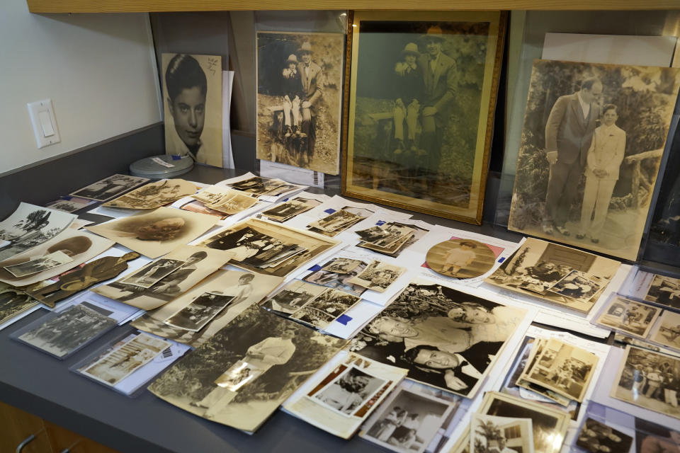 A collection of photographs from the estate of mob boss Al Capone is seen on display at Witherell's Auction House in Sacramento, Calif., Wednesday, Aug. 25, 2021. The photographs are among the 174 family heirlooms that will be up for sale at an Oct. 8 auction titled "A Century of Notoriety: The Estate of Al Capone," that will be held by Witherell's in Sacramento. (AP Photo/Rich Pedroncelli)