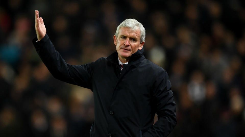 Mark Hughes and David Moyes had decidedly differing views on a penalty that set West Ham on their way to a 3-0 victory at Stoke City.