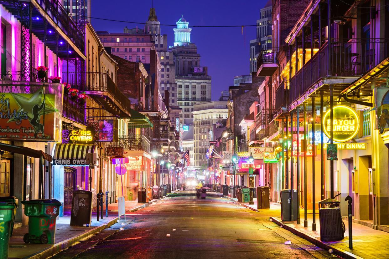 Clean Bourbon Street in New Orleans at night, brightly lite, no people