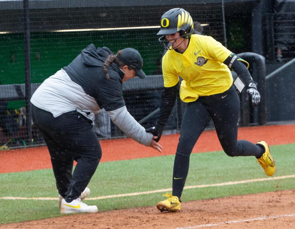 Oregon’s KK Humphreys is congratulated after hitting home run against Mount St. Mary’s during the Jane Sanders Classic Thursday, Feb. 29, 2024 at Jane Sanders Stadium in Eugene.