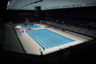 Tokyo Aquatics Center is seen after its grand opening ceremony Saturday, Oct. 24, 2020, in Tokyo. The Tokyo 2020 organizing committee held the grand opening ceremony Saturday at the aquatics center, planned to host Olympic artistic swimming, diving and swimming and Paralympics swimming events in 2021. (AP Photo/Eugene Hoshiko)