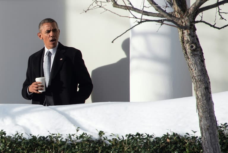 US President Barack Obama walks through the colonnade to the Oval Office at the White House in Washington, DC, on January 25, 2016