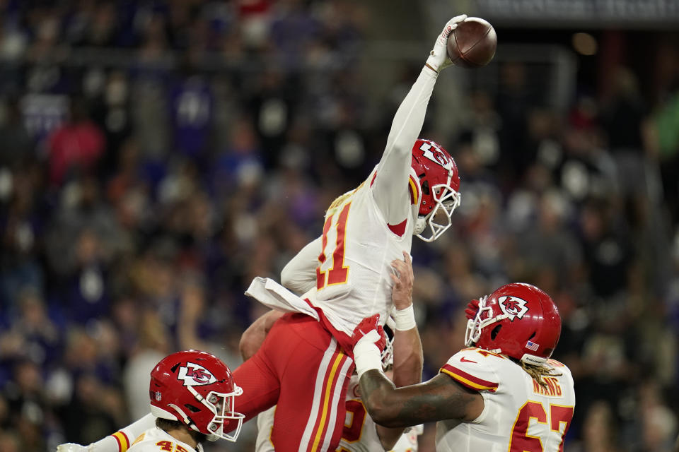 Kansas City Chiefs wide receiver Demarcus Robinson (11) celebrates after scoring a touchdown in the first half of an NFL football game against the Baltimore Ravens, Sunday, Sept. 19, 2021, in Baltimore. (AP Photo/Julio Cortez)